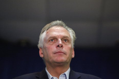 Democratic nominee for Virginia governor Terry McAuliffe stands onstage as former U.S. President Bill Clinton (unseen) campaigns for him at Democratic nominee for Virginia governor Terry McAuliffe stands onstage as former U.S. President Bill Clinton (unseen) campaigns for him at
