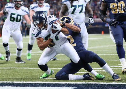 Oct 28, 2013; St. Louis, MO, USA; Seattle Seahawks wide receiver Golden Tate (81) catches a pass for a touchdown defended by St. Louis Rams Oct 28, 2013; St. Louis, MO, USA; Seattle Seahawks wide receiver Golden Tate (81) catches a pass for a touchdown defended by St. Louis Rams