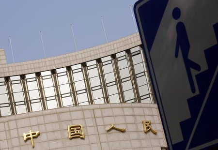 A sign showing the entrance to an underway passage is seen outside the headquarters of the People's Bank of China, the central bank, in Beij A sign showing the entrance to an underway passage is seen outside the headquarters of the People's Bank of China, the central bank, in Beij