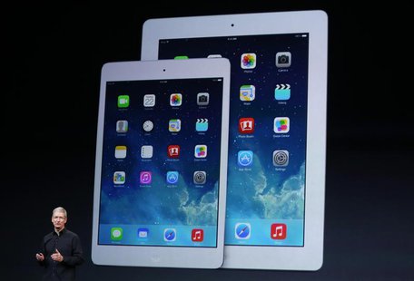 Apple Inc CEO Tim Cook speaks on stage about the new iPad during an Apple event in San Francisco, California October 22, 2013. REUTERS/Rober Apple Inc CEO Tim Cook speaks on stage about the new iPad during an Apple event in San Francisco, California October 22, 2013. REUTERS/Rober