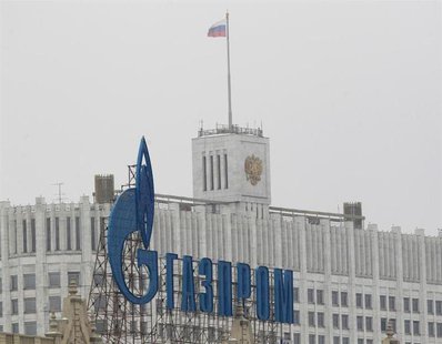 The company logo of Russian natural gas producer Gazprom is seen on an advertisement in front of the White House in Moscow February 8, 2013. The company logo of Russian natural gas producer Gazprom is seen on an advertisement in front of the White House in Moscow February 8, 2013.
