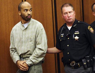 Michael Madison (L) is led out of court after appearing for a pre-trial hearing in Cleveland September 9, 2013. Madison, 35, is accused of m Michael Madison (L) is led out of court after appearing for a pre-trial hearing in Cleveland September 9, 2013. Madison, 35, is accused of m