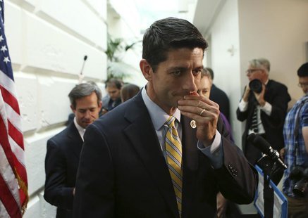 Rep. Paul Ryan (R-WI) departs after a news conference by U.S. Speaker of the House John Boehner (R-OH) and other Republican House members in Rep. Paul Ryan (R-WI) departs after a news conference by U.S. Speaker of the House John Boehner (R-OH) and other Republican House members in