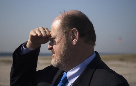 Republican New York City mayoral candidate Joe Lhota looks towards the shoreline during a visit to the Breezy Point, Queens beach community Republican New York City mayoral candidate Joe Lhota looks towards the shoreline during a visit to the Breezy Point, Queens beach community