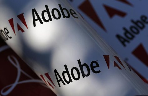 Adobe company logos are seen in this picture illustration taken in Vienna July 9, 2013. Picture taken July 9, 2013. REUTERS/Leonhard Foeger Adobe company logos are seen in this picture illustration taken in Vienna July 9, 2013. Picture taken July 9, 2013. REUTERS/Leonhard Foeger
