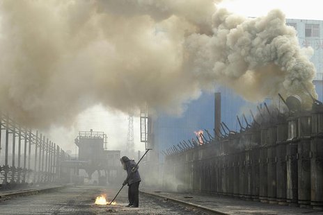 A labourer works at a coking plant in Changzhi, north China's Shanxi province, July 7, 2007. REUTERS/Stringer A labourer works at a coking plant in Changzhi, north China's Shanxi province, July 7, 2007. REUTERS/Stringer