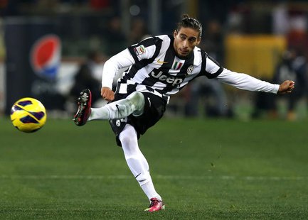 Juventus' Martin Caceres kicks the ball during his Italian Serie A soccer match against AS Roma at the Olympic stadium in Rome February 16, Juventus' Martin Caceres kicks the ball during his Italian Serie A soccer match against AS Roma at the Olympic stadium in Rome February 16,