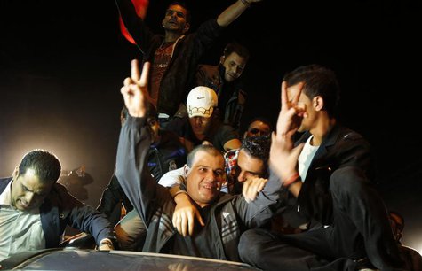 A released Palestinian prisoner reacts upon his arrival at the Erez crossing between Israel and the northern Gaza Strip October 30, 2013. RE A released Palestinian prisoner reacts upon his arrival at the Erez crossing between Israel and the northern Gaza Strip October 30, 2013. RE