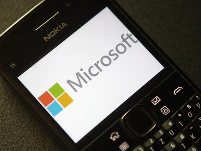 A photo illustration shows the Microsoft logo displayed on a Nokia phone in Vienna September 3, 2013. REUTERS/Heinz-Peter Bader A photo illustration shows the Microsoft logo displayed on a Nokia phone in Vienna September 3, 2013. REUTERS/Heinz-Peter Bader