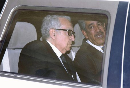 United Nations Peace Envoy for Syria Lakhdar Brahimi (L) sits in a car as he leaves a hotel in Damascus October 28, 2013. REUTERS/Khaled al- United Nations Peace Envoy for Syria Lakhdar Brahimi (L) sits in a car as he leaves a hotel in Damascus October 28, 2013. REUTERS/Khaled al-
