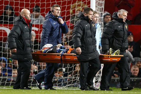 Norwich City's Robert Snodgrass is stretchered off during their English League Cup fourth round soccer match against Manchester United at Ol Norwich City's Robert Snodgrass is stretchered off during their English League Cup fourth round soccer match against Manchester United at Ol