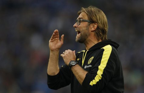 Borussia Dortmund's coach Juergen Klopp reacts during the German first division Bundesliga soccer match against Schalke 04 in Gelsenkirchen Borussia Dortmund's coach Juergen Klopp reacts during the German first division Bundesliga soccer match against Schalke 04 in Gelsenkirchen