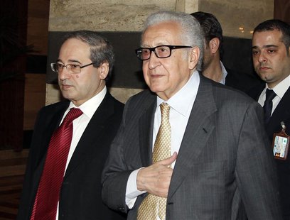 United Nations Envoy Lakhdar Brahimi (C) returns to a hotel after meeting Syria's President Bashar al-Assad in the Syrian capital Damascus O United Nations Envoy Lakhdar Brahimi (C) returns to a hotel after meeting Syria's President Bashar al-Assad in the Syrian capital Damascus O