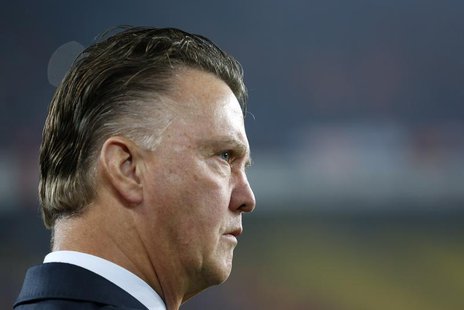 Netherlands' coach Louis Van Gaal looks at his players before the 2014 World Cup Group D qualifying soccer match against Turkey at Sukru Sar Netherlands' coach Louis Van Gaal looks at his players before the 2014 World Cup Group D qualifying soccer match against Turkey at Sukru Sar