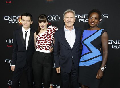 Cast members Asa Butterfield (L-R), Hailee Steinfeld, Harrison Ford and Viola Davis pose at the premiere of "Ender's Game" at the TCL Chines Cast members Asa Butterfield (L-R), Hailee Steinfeld, Harrison Ford and Viola Davis pose at the premiere of "Ender's Game" at the TCL Chines