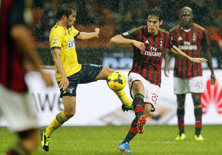 AC Milan's Kaka (R) fights for the ball with Lazio's Alvaro Gonzalez during their Italian Serie A soccer match at San Siro stadium in Milan AC Milan's Kaka (R) fights for the ball with Lazio's Alvaro Gonzalez during their Italian Serie A soccer match at San Siro stadium in Milan