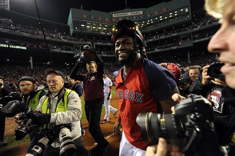 Oct 30, 2013; Boston, MA, USA; Boston Red Sox designated hitter David Ortiz celebrates on the field after game six of the MLB baseball World Oct 30, 2013; Boston, MA, USA; Boston Red Sox designated hitter David Ortiz celebrates on the field after game six of the MLB baseball World