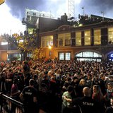 Fans gather after the Boston Red Sox won the MLB baseball's World Series by beating St. Louis Cardinals in Game 6, at Landsdown Street near Fans gather after the Boston Red Sox won the MLB baseball's World Series by beating St. Louis Cardinals in Game 6, at Landsdown Street near