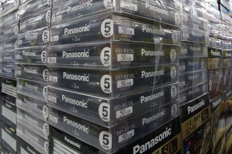 Panasonic Corp's logos are seen at an electronics store in Tokyo May 9, 2013. REUTERS/Toru Hanai Panasonic Corp's logos are seen at an electronics store in Tokyo May 9, 2013. REUTERS/Toru Hanai