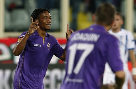 Fiorentina's Juan Cuadrado celebrates after scoring against Pandurii Targu-Jiu during their Europa League soccer match at the Artemio Franch Fiorentina's Juan Cuadrado celebrates after scoring against Pandurii Targu-Jiu during their Europa League soccer match at the Artemio Franch