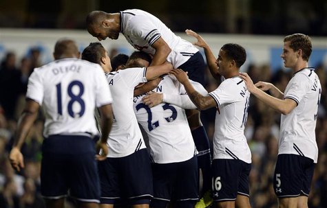 Tottenham Hotspur's Gylfi Sigurdsson (obscured) celebrates his goal against Hull City with teammates during their English League Cup fourth Tottenham Hotspur's Gylfi Sigurdsson (obscured) celebrates his goal against Hull City with teammates during their English League Cup fourth