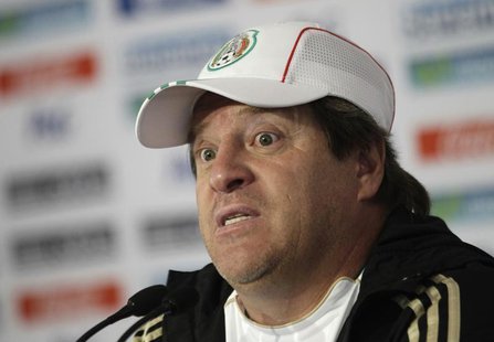Mexico's national soccer team coach Miguel Herrera listens to a journalist's question during a news conference after a friendly match agains Mexico's national soccer team coach Miguel Herrera listens to a journalist's question during a news conference after a friendly match agains
