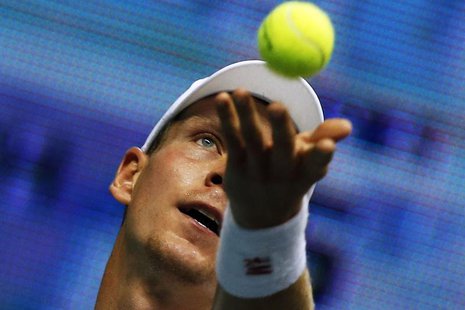 Tomas Berdych of the Czech Republic serves against Gilles Simon of France during their men's singles semi-finals match at the Thailand Open Tomas Berdych of the Czech Republic serves against Gilles Simon of France during their men's singles semi-finals match at the Thailand Open