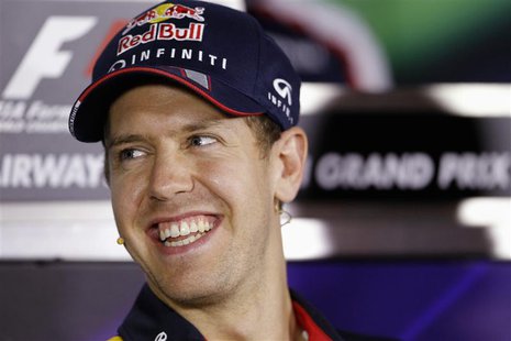 Red Bull Formula One driver Sebastian Vettel of Germany attends a news conference ahead of the Abu Dhabi F1 Grand Prix at the Yas Marina cir Red Bull Formula One driver Sebastian Vettel of Germany attends a news conference ahead of the Abu Dhabi F1 Grand Prix at the Yas Marina cir