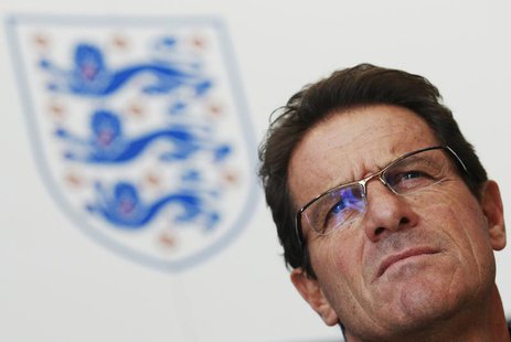 England soccer manager Fabio Capello speaks to the media at the Grove Hotel near Watford August 9, 2010. REUTERS/Luke MacGregor England soccer manager Fabio Capello speaks to the media at the Grove Hotel near Watford August 9, 2010. REUTERS/Luke MacGregor