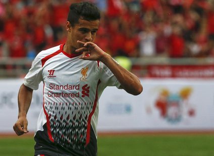 Liverpool's Philippe Coutinho celebrates after scoring against Thailand's national team during their friendly soccer match at Ratchamangkala Liverpool's Philippe Coutinho celebrates after scoring against Thailand's national team during their friendly soccer match at Ratchamangkala