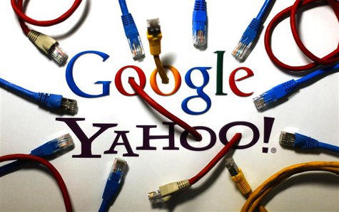 An illustration picture shows the logos of Google and Yahoo connected with LAN cables in a Berlin office October 31, 2013. REUTERS/Pawel Kop An illustration picture shows the logos of Google and Yahoo connected with LAN cables in a Berlin office October 31, 2013. REUTERS/Pawel Kop