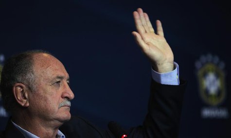 Brazilian national soccer team head coach Luiz Felipe Scolari waves during a news conference in Rio de Janeiro October 31, 2013. REUTERS/Ser Brazilian national soccer team head coach Luiz Felipe Scolari waves during a news conference in Rio de Janeiro October 31, 2013. REUTERS/Ser