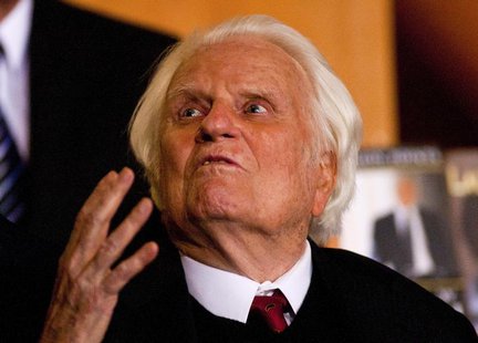 Billy Graham gestures while attending a book signing for former U.S. President George W. Bush's new book "Decision Points" at the Billy Grah Billy Graham gestures while attending a book signing for former U.S. President George W. Bush's new book "Decision Points" at the Billy Grah
