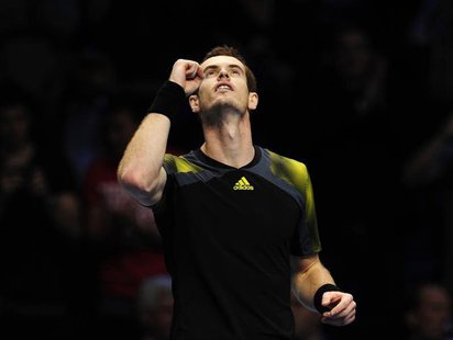 Andy Murray of Britain celebrates defeating Tomas Berdych of Czech Republic in their men's singles tennis match at the ATP World Tour Finals Andy Murray of Britain celebrates defeating Tomas Berdych of Czech Republic in their men's singles tennis match at the ATP World Tour Finals
