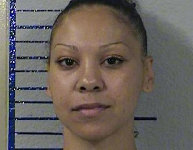 Sara Kruzan, 35, is seen in a handout photo from the California Department of Corrections taken July 8, 2013. REUTERS/California Department Sara Kruzan, 35, is seen in a handout photo from the California Department of Corrections taken July 8, 2013. REUTERS/California Department