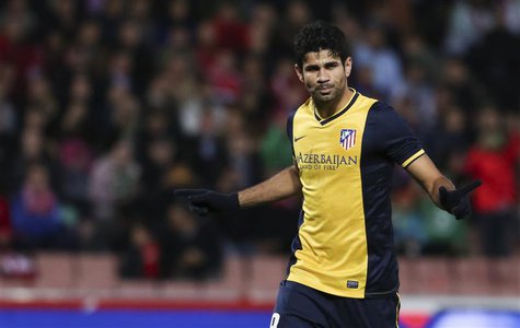 Atletico Madrid's Diego Costa celebrates after scoring against Granada during their Spanish First Division soccer match at Nuevo Los Carmene Atletico Madrid's Diego Costa celebrates after scoring against Granada during their Spanish First Division soccer match at Nuevo Los Carmene