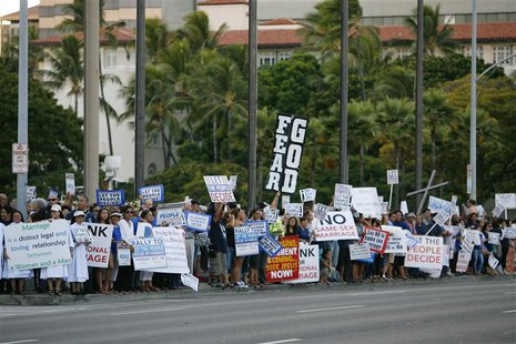 People gather at a rally against same sex marriage at the Hawaii State Capital in Honolulu October 28, 2013. REUTERS/Hugh Gentry People gather at a rally against same sex marriage at the Hawaii State Capital in Honolulu October 28, 2013. REUTERS/Hugh Gentry