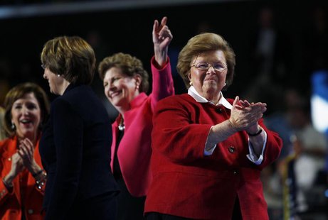 U.S. Senator Barbara Mikulski (D-MD) (R) walks off stage with fellow female members of the U.S. Senate after addressing the second session o U.S. Senator Barbara Mikulski (D-MD) (R) walks off stage with fellow female members of the U.S. Senate after addressing the second session o
