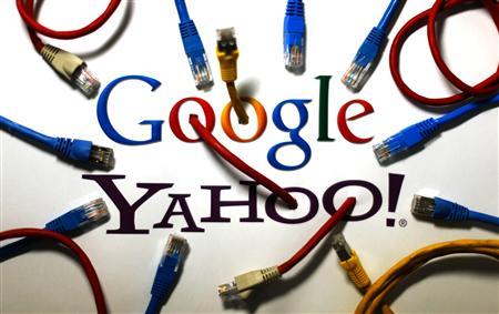 An illustration picture shows the logos of Google and Yahoo connected with LAN cables in a Berlin office October 31, 2013.
Credit: Reuters/Pawel Kopczynski An illustration picture shows the logos of Google and Yahoo connected with LAN cables in a Berlin office October 31, 2013.
Credit: Reuters/Pawel Kopczynski
