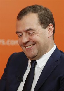 Russia's Prime Minister Dmitry Medvedev smiles during an interview with Reuters in Moscow, October 31, 2013. REUTERS/Grigory Dukor Russia's Prime Minister Dmitry Medvedev smiles during an interview with Reuters in Moscow, October 31, 2013. REUTERS/Grigory Dukor