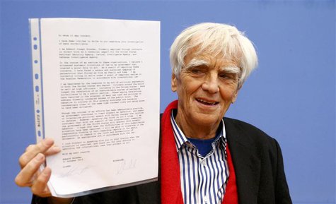 German Greens lawmaker Hans-Christian Stroebele holds a letter he received from fugitive former U.S. spy agency contractor Edward Snowden, a German Greens lawmaker Hans-Christian Stroebele holds a letter he received from fugitive former U.S. spy agency contractor Edward Snowden, a