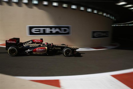 Lotus F1 Formula One driver Kimi Raikkonen of Finland drives during the first practice session of the Abu Dhabi F1 Grand Prix at the Yas Mar Lotus F1 Formula One driver Kimi Raikkonen of Finland drives during the first practice session of the Abu Dhabi F1 Grand Prix at the Yas Mar