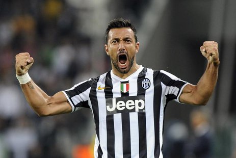 Juventus' Fabio Quagliarella celebrates after scoring against Galatasaray during their Champions League soccer match at the Juventus stadium Juventus' Fabio Quagliarella celebrates after scoring against Galatasaray during their Champions League soccer match at the Juventus stadium