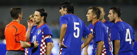 Croatia's captain Niko Kovac and teammates protest against referee Lubos Michel's decision to send Robert Kovac off during their World Cup 2 Croatia's captain Niko Kovac and teammates protest against referee Lubos Michel's decision to send Robert Kovac off during their World Cup 2