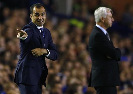 Everton's manager Roberto Martinez (L) instructs his team during their English Premier League soccer match against Newcastle United at Goodi Everton's manager Roberto Martinez (L) instructs his team during their English Premier League soccer match against Newcastle United at Goodi