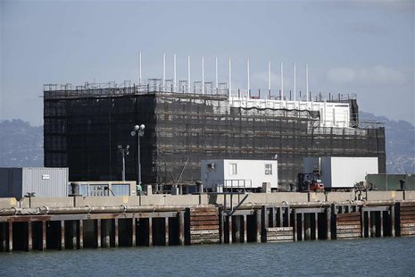 A barge built with four levels of shipping containers is seen at Pier 1 at Treasure Island in San Francisco, California October 28, 2013. RE A barge built with four levels of shipping containers is seen at Pier 1 at Treasure Island in San Francisco, California October 28, 2013. RE