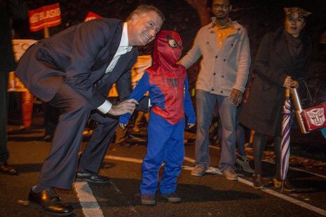 Democratic New York City mayoral candidate Bill de Blasio poses with a child dressed as Spiderman during the Park Slope Halloween Parade in Democratic New York City mayoral candidate Bill de Blasio poses with a child dressed as Spiderman during the Park Slope Halloween Parade in