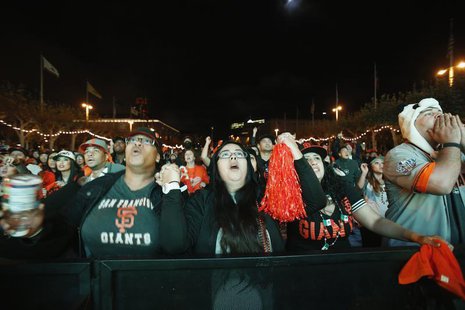 Fans reacts to a live broadcast the MLB baseball World Series game 4 between the San Francisco Giants and Detroit Tigers at Civic Center Pla Fans reacts to a live broadcast the MLB baseball World Series game 4 between the San Francisco Giants and Detroit Tigers at Civic Center Pla