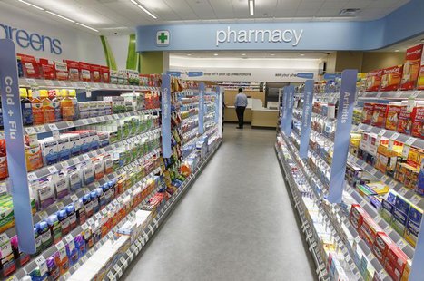 Cold and flu products are pictured on shelving during a private cocktail event celebrating the grand opening of drugstore chain Walgreens ne Cold and flu products are pictured on shelving during a private cocktail event celebrating the grand opening of drugstore chain Walgreens ne