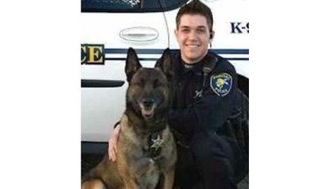 Officer Casey J. Kohlmeier and his K-9 partner Draco Officer Casey J. Kohlmeier and his K-9 partner Draco